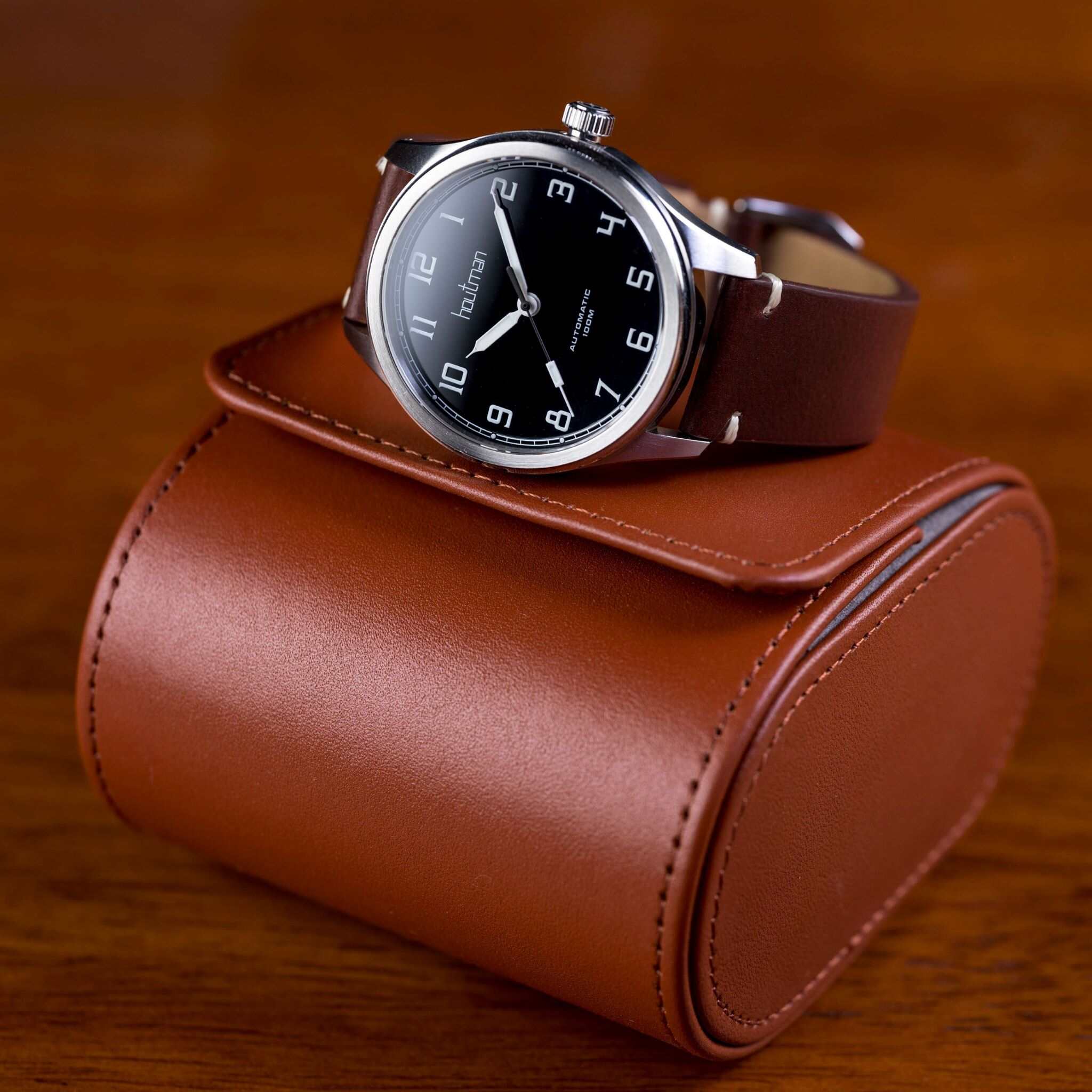 pilot watch with gloss black dial with brown leather strap