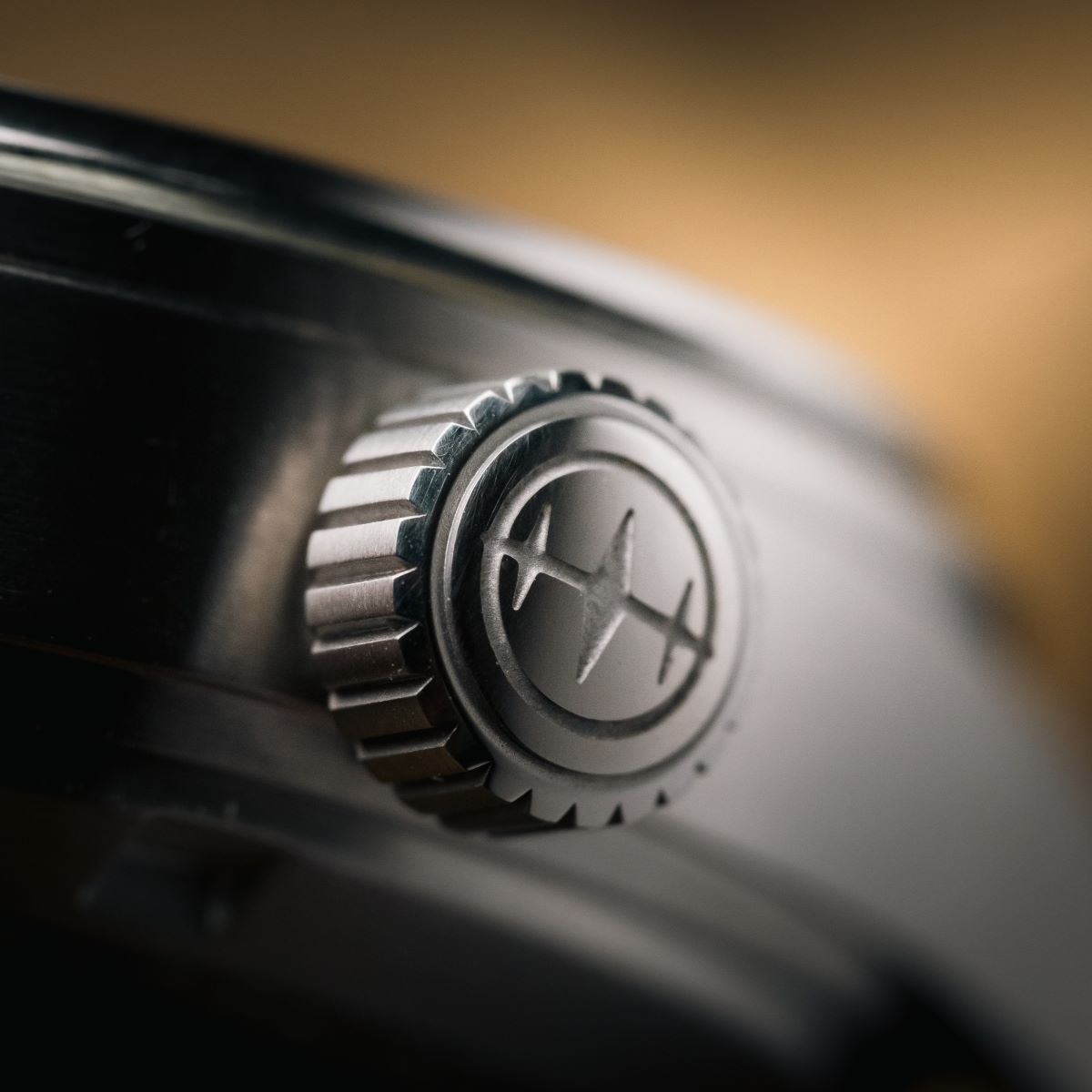 Close up of Australian Watch brand Houtman Watches crown, engraved logo