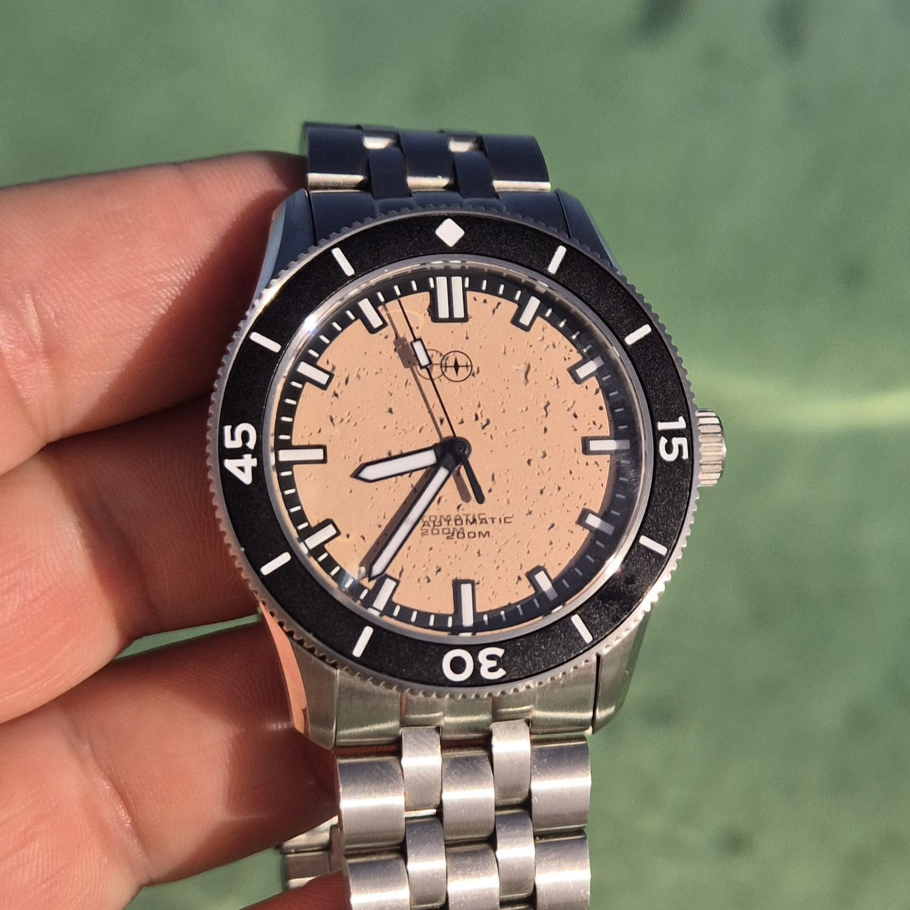 unique dive watch with compressed rock dial