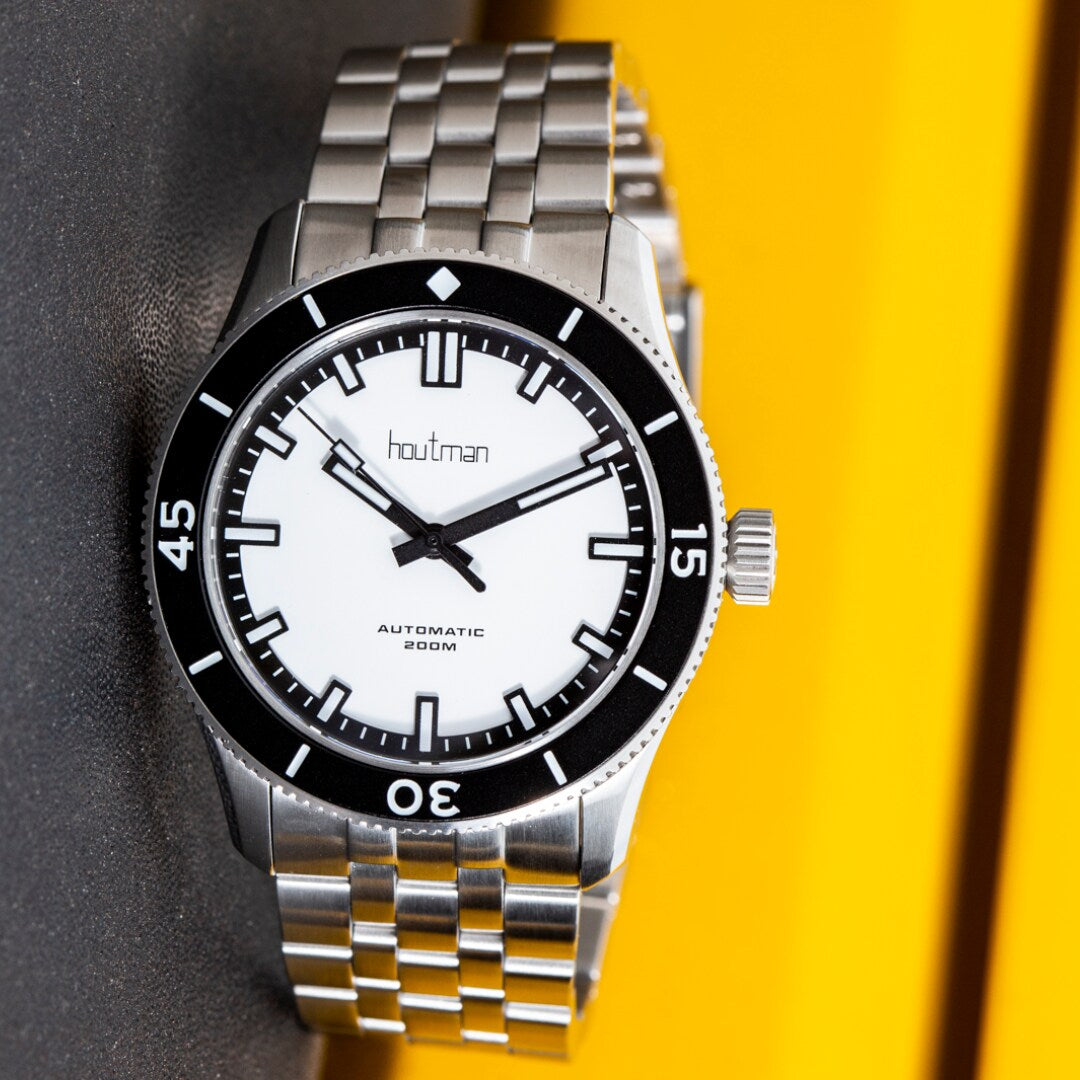 Dive watch with matte white dial and matte black contrasting hands